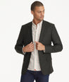 Model is wearing UNTUCKit Italian Wool Westerling Sport Coat in Olive.