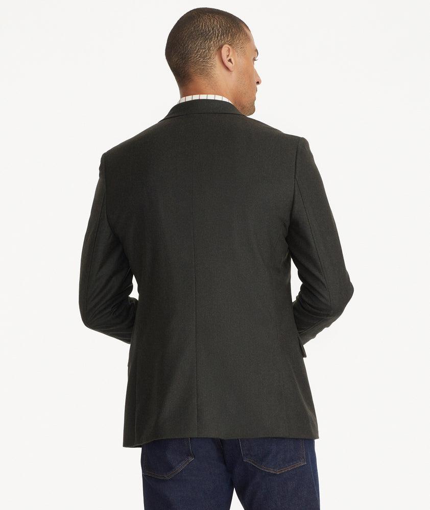 Model is wearing UNTUCKit Italian Wool Westerling Sport Coat in Olive.