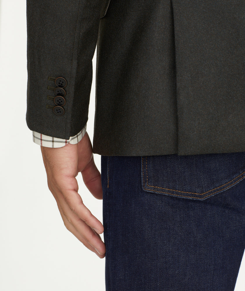 Model is wearing UNTUCKit Italian Wool Westerling Sport Coat in Olive.