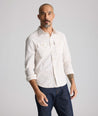 Model is wearing UNTUCKit Vintage Wash Short-Sleeve Whitford Shirt. 