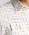 Model is wearing UNTUCKit Vintage Wash Short-Sleeve Whitford Shirt. 