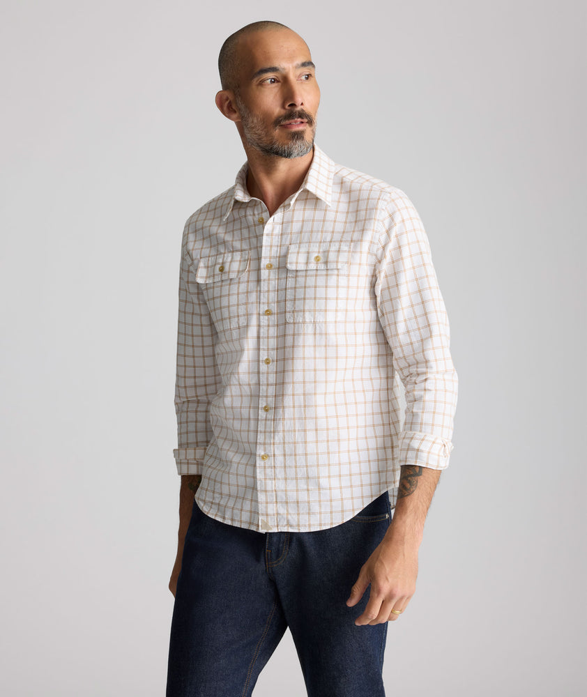 Model is wearing UNTUCKit Vintage Wash Short-Sleeve Whitford Shirt. 