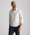 Model is wearing UNTUCKit Vintage Wash Short-Sleeve Whitford Shirt. 