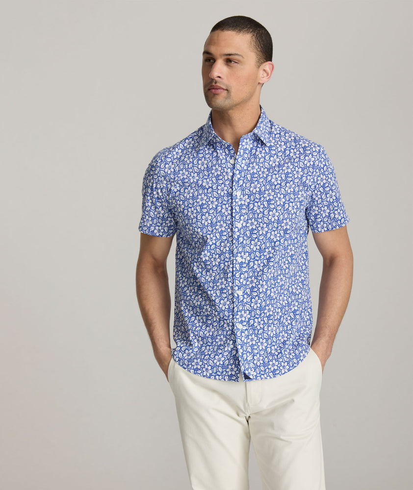 Model is wearing UNTICKit Wilson shirt in blue. 