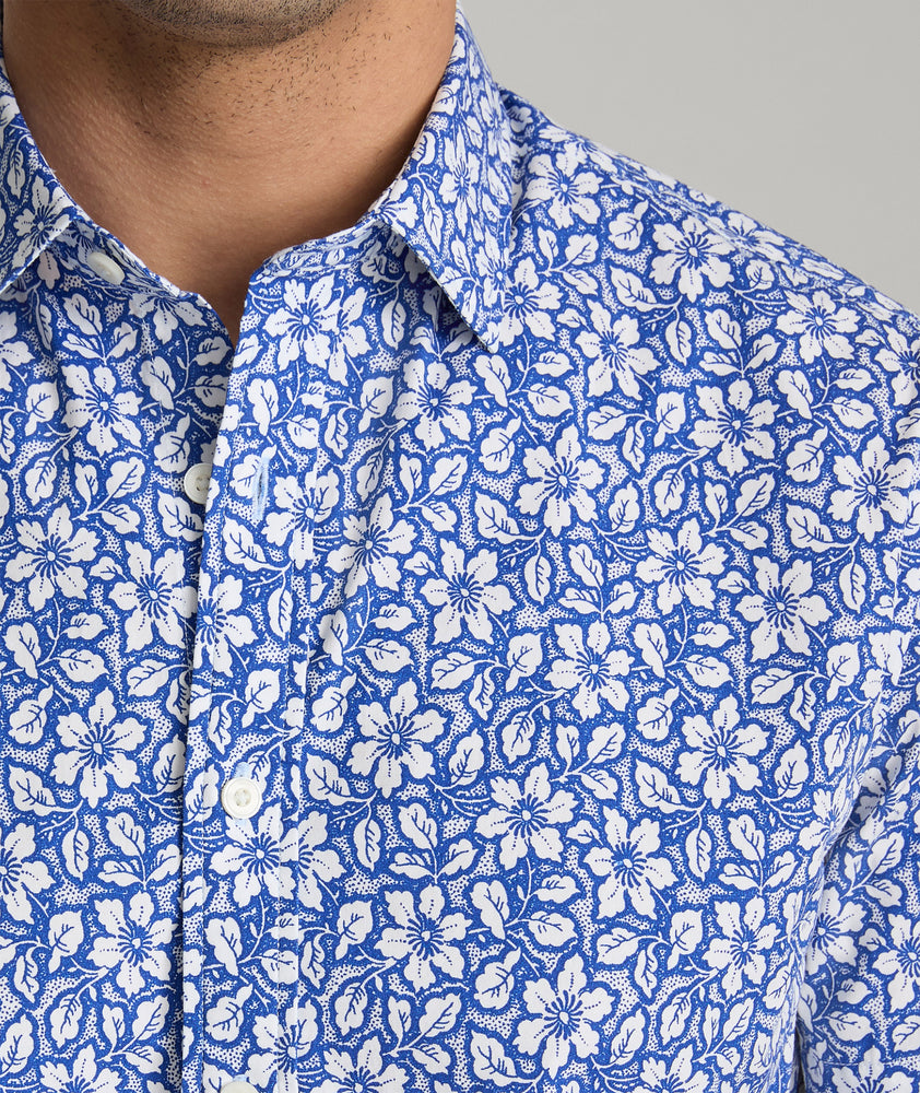 Model is wearing UNTICKit Wilson shirt in blue. 
