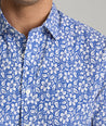 Model is wearing UNTICKit Wilson shirt in blue. 