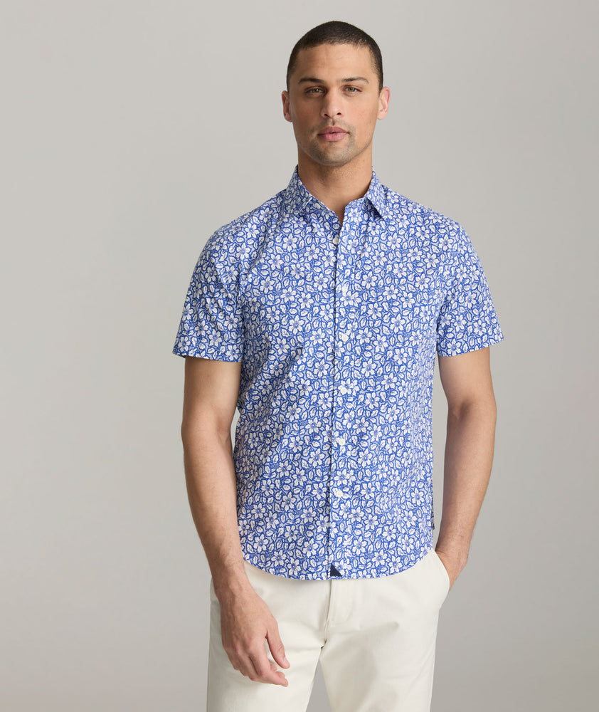 Model is wearing UNTICKit Wilson shirt in blue. 