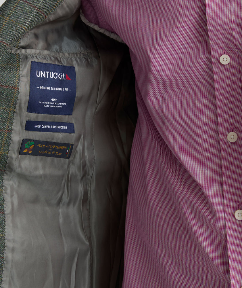  Model is wearing UNTUCKit Italian Wool Windsteig Sport Coat in Olive & Multicolor Windowpane.