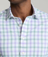 Model is wearing UNTUCKit Winwood performance shirt in purple. 