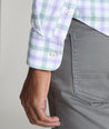 Model is wearing UNTUCKit Winwood performance shirt in purple. 
