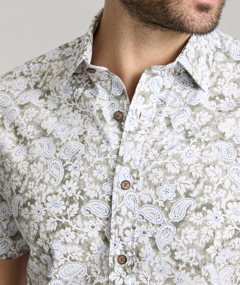 Model is wearing UNTUCKit wright short sleeve shirt. 