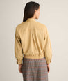 Model is wearing UNTUCKit Zadie jacket. 