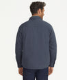 Model is wearing UNTUCKit Ziraldo Jacket in navy. 