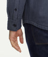 Model is wearing UNTUCKit Ziraldo Jacket in navy. 