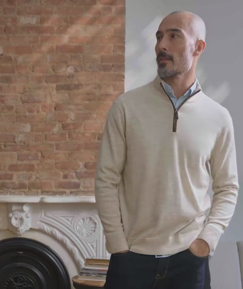 Video of model wearing a merino wool quarter-zip