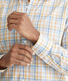 Model is wearing UNTUCKit Orange Plaid Wrinkle-Free Abrusco Shirt.