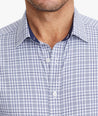 Model wearing a Navy Wrinkle-Free Performance Armand Shirt