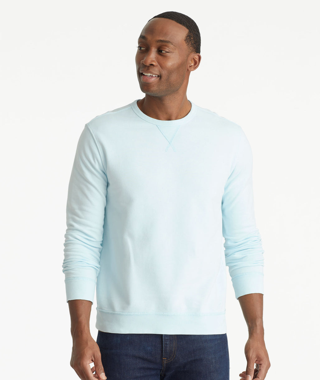 Model wearing an UNTUCKit Bright Blue Mineral Dye Sweatshirt