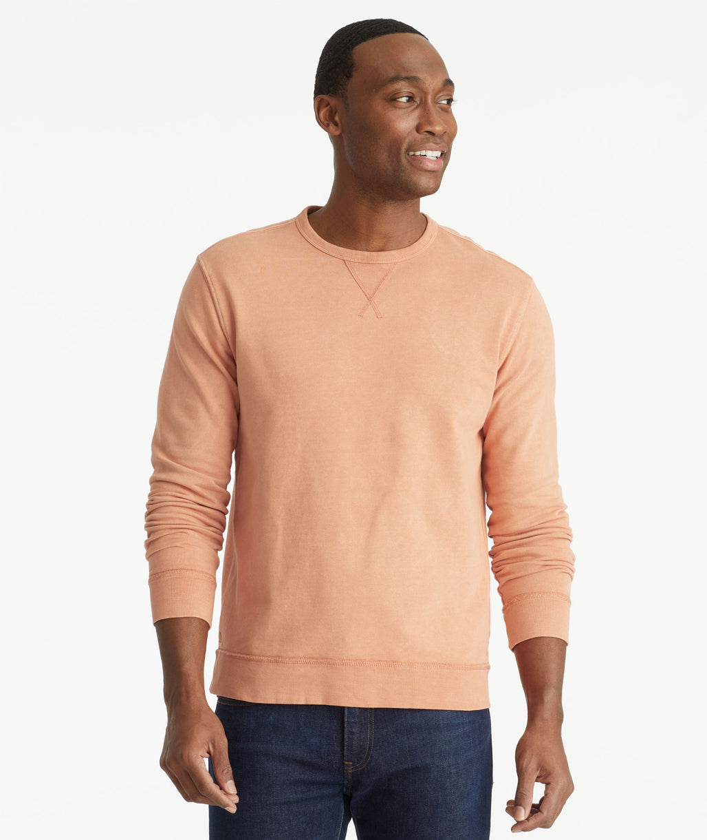 Model wearing an UNTUCKit Orange Mineral Dye Sweatshirt