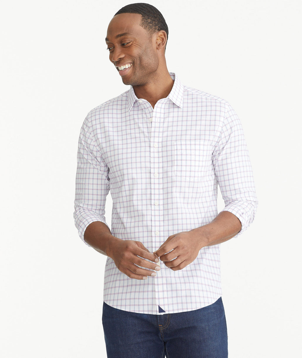 Model wearing an UNTUCKit pink Wrinkle-Free Barsol Shirt