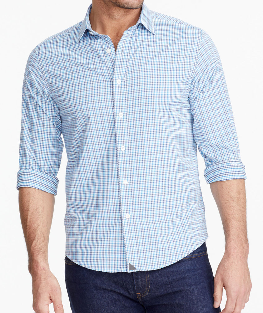 Model wearing a Mid Blue Wrinkle-Free Performance+ Breganze Shirt