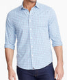 Model wearing a Mid Blue Wrinkle-Free Performance+ Breganze Shirt