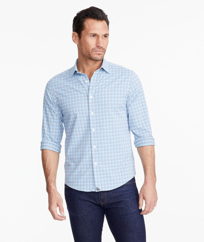 Model wearing a Mid Blue Wrinkle-Free Performance+ Breganze Shirt