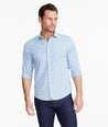 Model wearing a Mid Blue Wrinkle-Free Performance+ Breganze Shirt