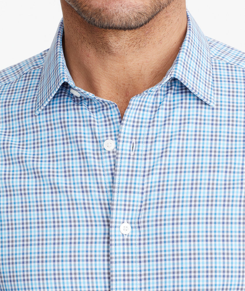 Model wearing a Mid Blue Wrinkle-Free Performance+ Breganze Shirt