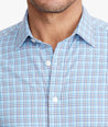 Model wearing a Mid Blue Wrinkle-Free Performance+ Breganze Shirt