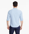 Model wearing a Mid Blue Wrinkle-Free Performance+ Breganze Shirt