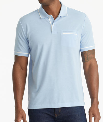 Model wearing an UNTUCKit Blue No Sweat Polo with Tipping