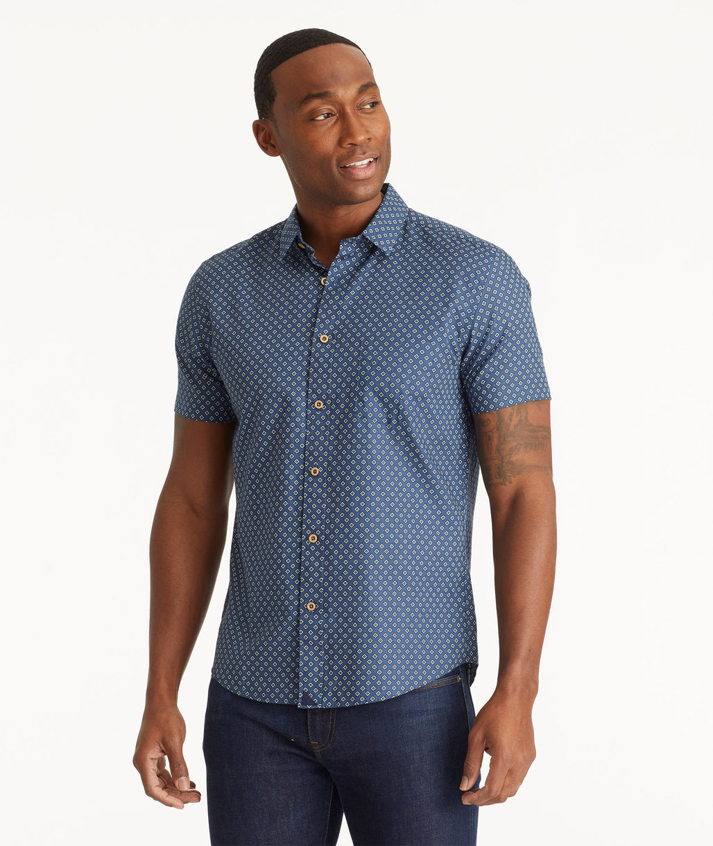 Model wearing an UNTUCKit Navy CASSIAN-SS