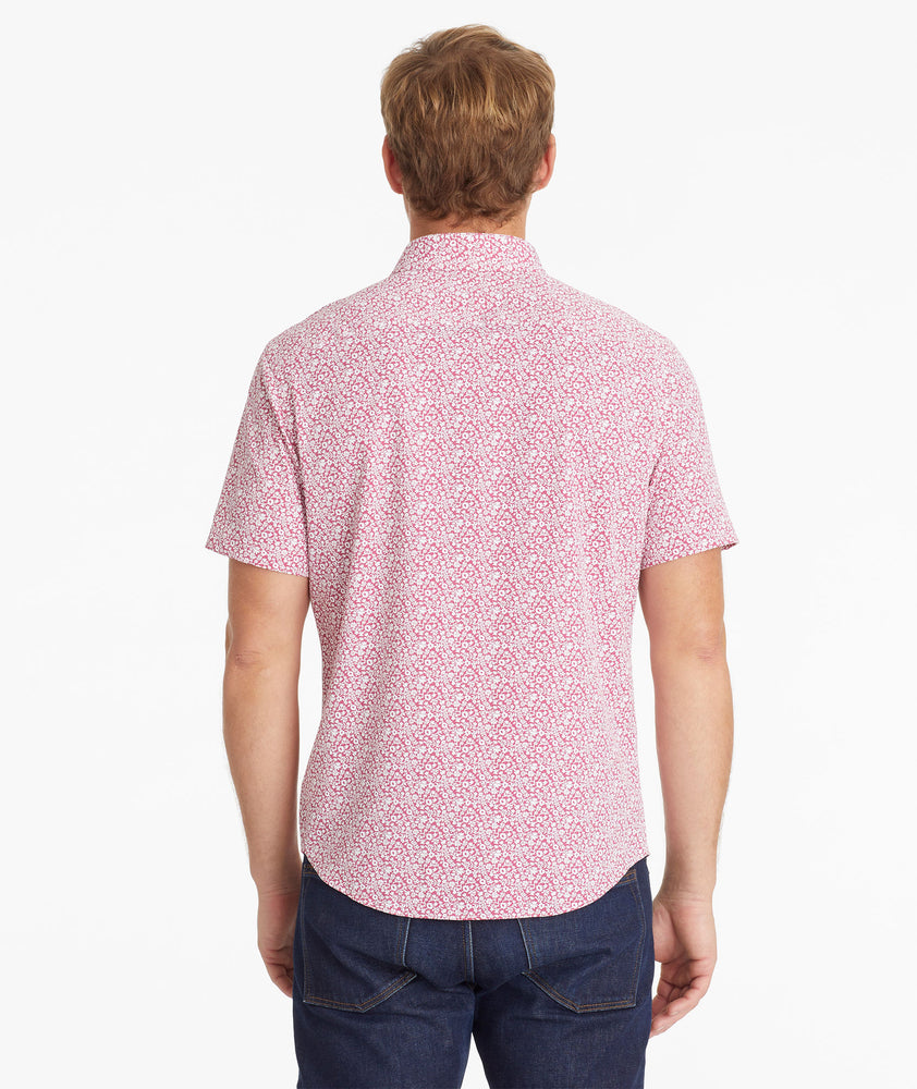 Model wearing an UNTUCKit Light Red Wrinkle-Free Performance Short-Sleeve Chaddsford Shirt