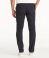 Model wearing UNTUCKit Black Traveler Pants
