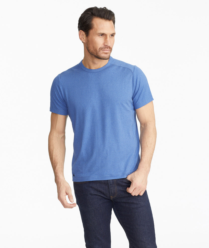 Model wearing a Bright Blue Performance Tee
