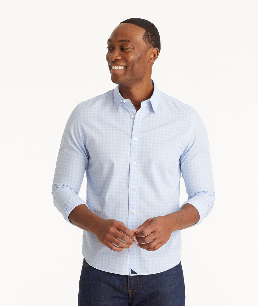 Model wearing an UNTUCKit Light Blue Wrinkle-Free Collalto Shirt