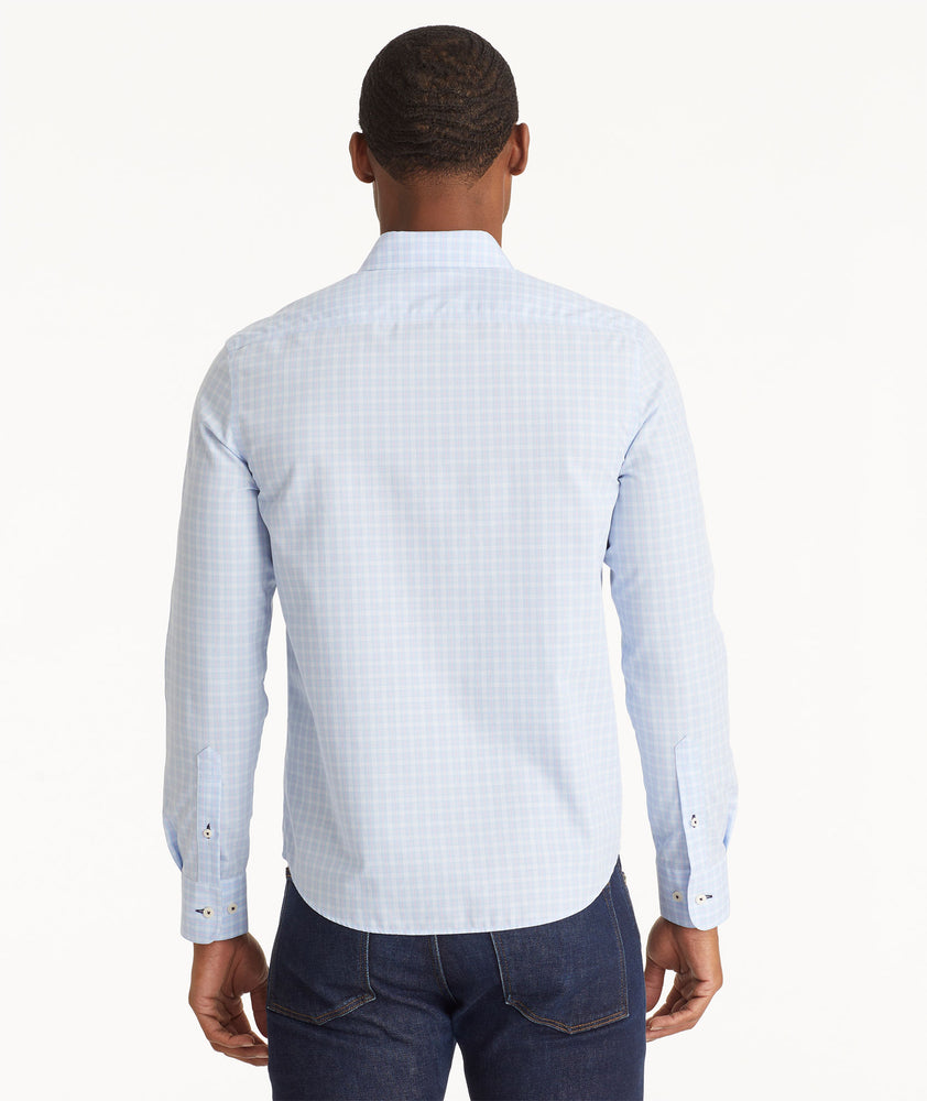 Model wearing an UNTUCKit Light Blue Wrinkle-Free Collalto Shirt