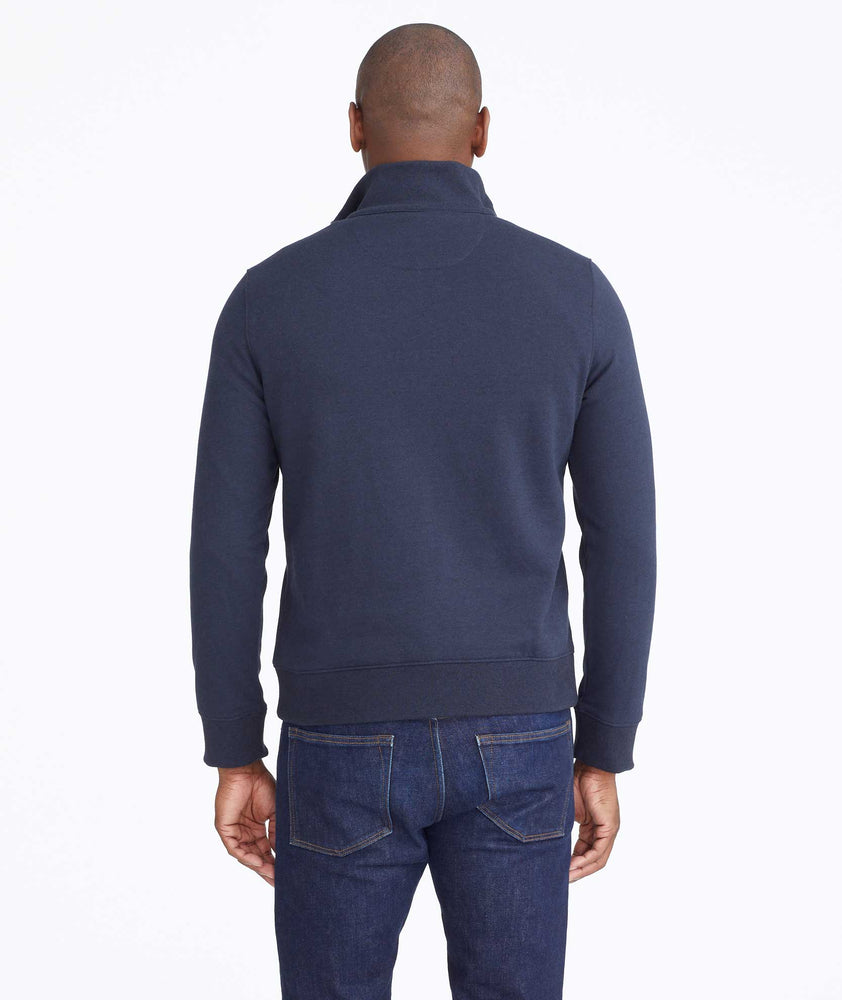 Model wearing a Navy Quarter-Zip Sweatshirt