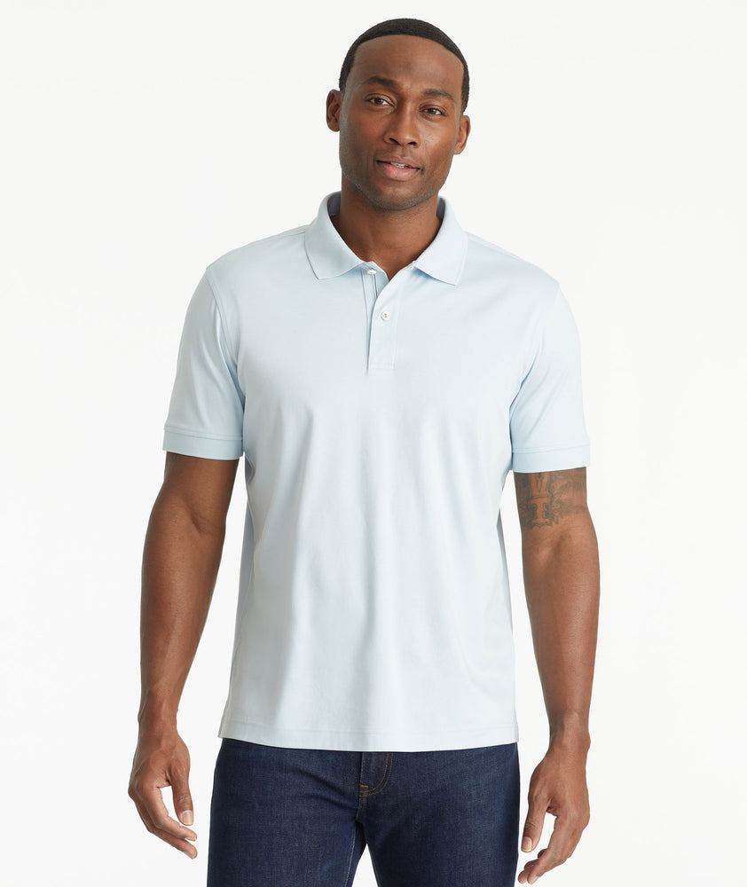 Model wearing an UNTUCKit Baby Blue Wrinkle-Free Damaschino Polo