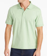 Model wearing an UNTUCKit Quiet Green Wrinkle-Free Damaschino Polo