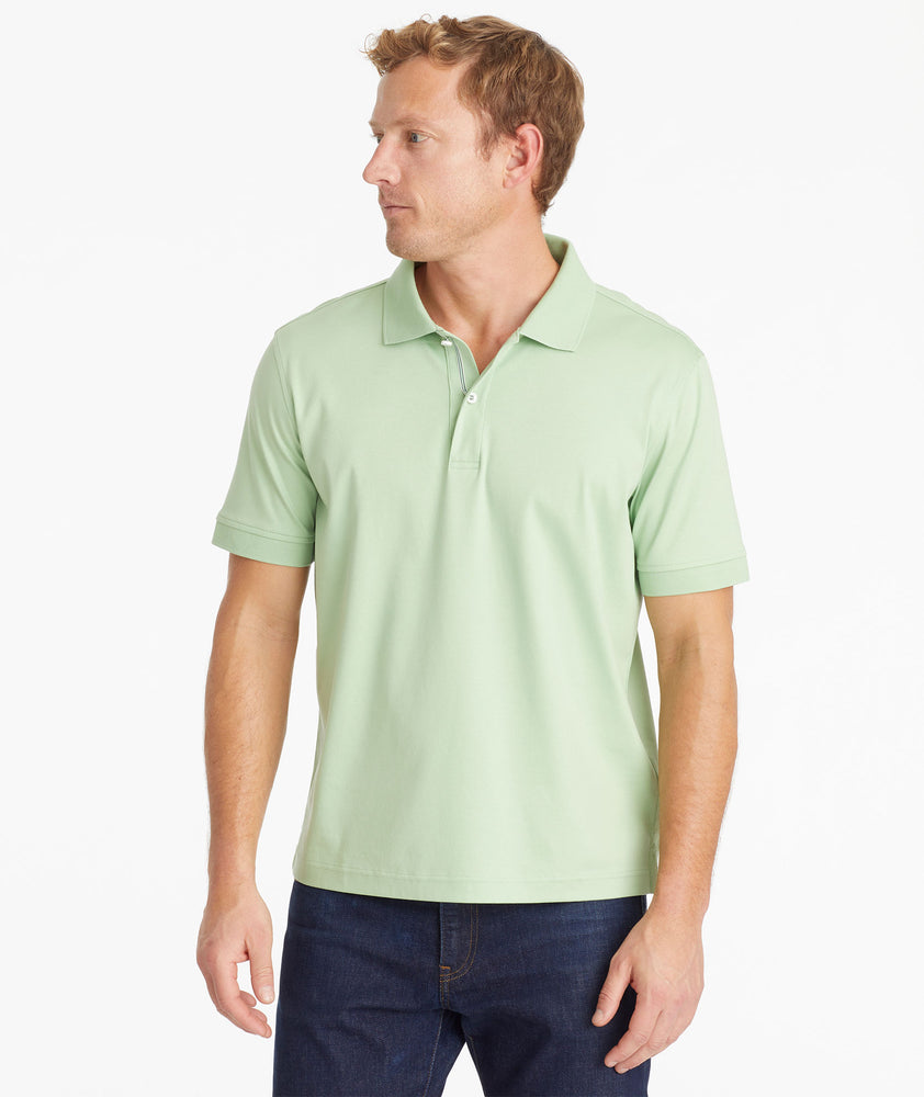Model wearing an UNTUCKit Quiet Green Wrinkle-Free Damaschino Polo
