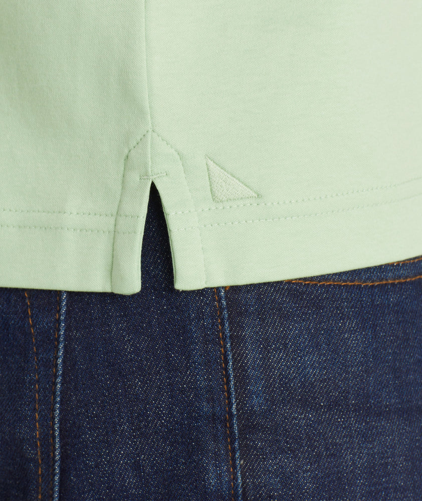 Model wearing an UNTUCKit Quiet Green Wrinkle-Free Damaschino Polo
