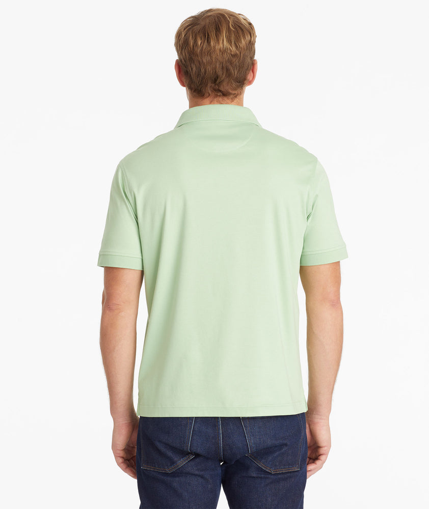 Model wearing an UNTUCKit Quiet Green Wrinkle-Free Damaschino Polo