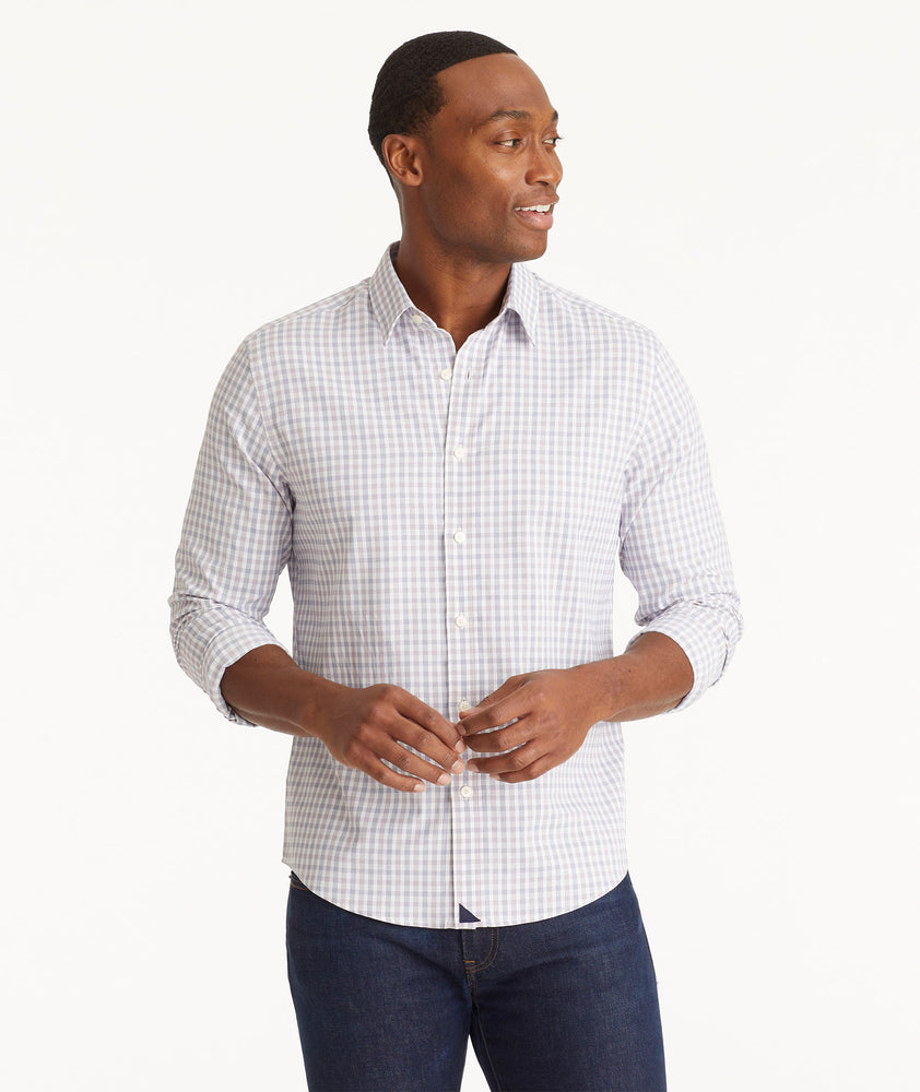 Model wearing an UNTUCKit Purple Wrinkle-Free Performance Duras Shirt