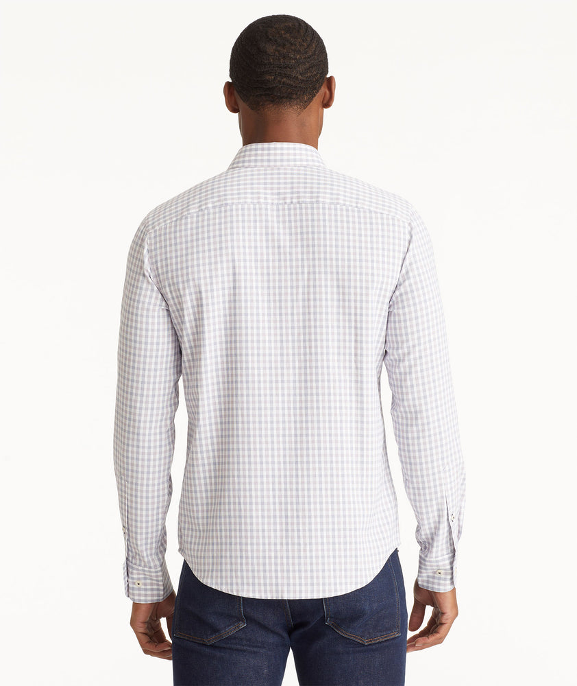 Model wearing an UNTUCKit Purple Wrinkle-Free Performance Duras Shirt