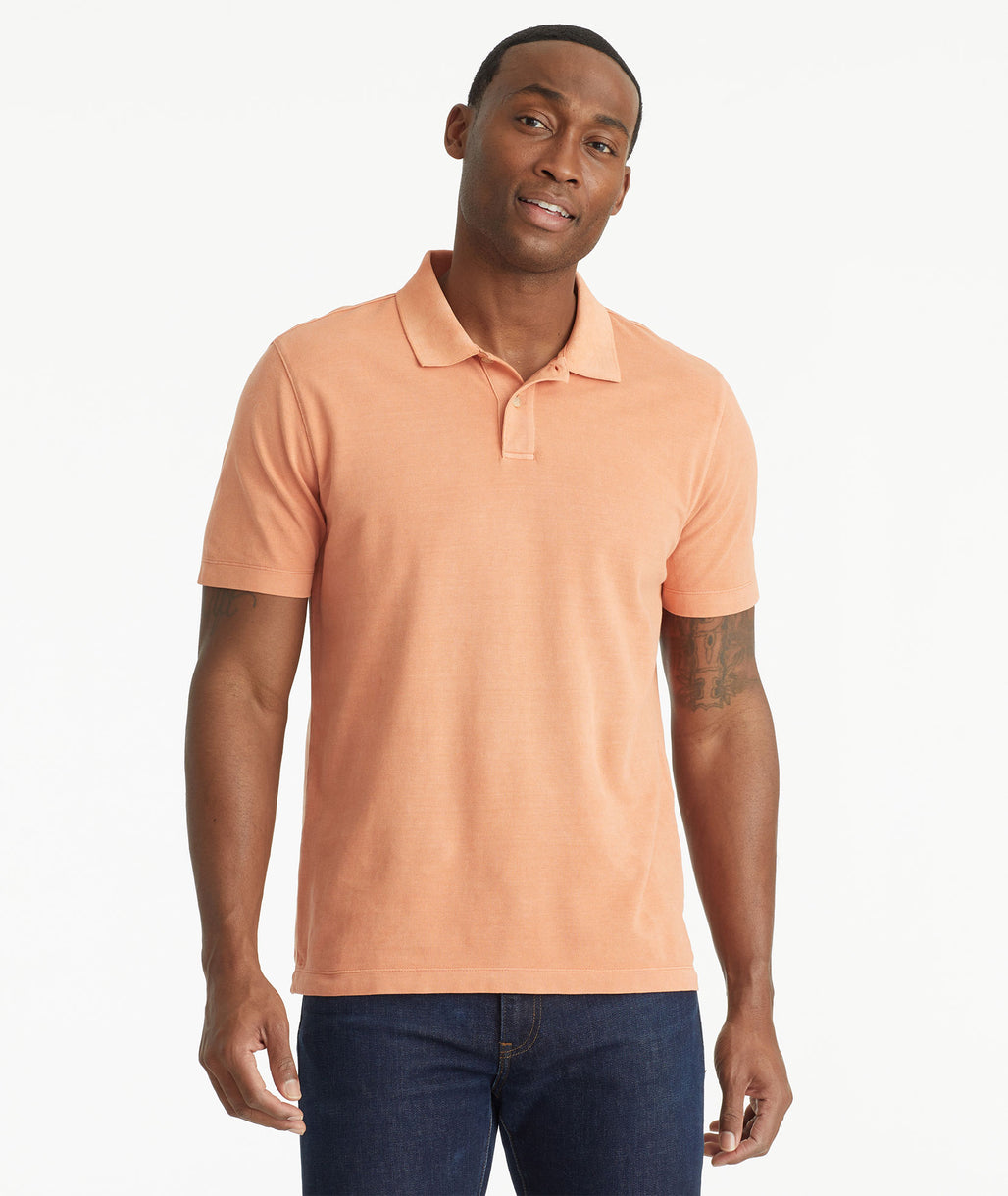 Model wearing an UNTUCKit Orange Mineral Dye Polo