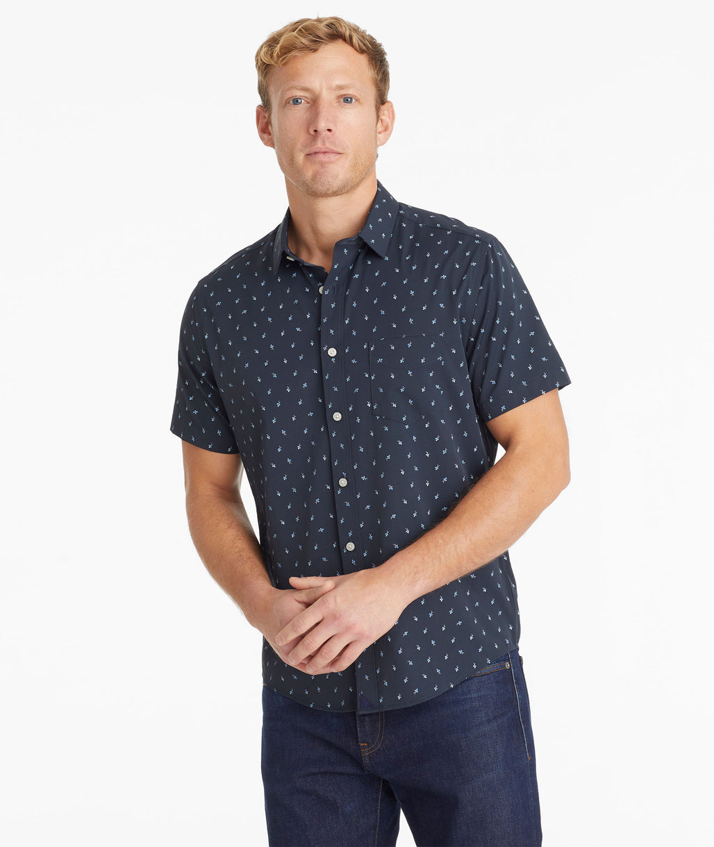 Model wearing an UNTUCKit Navy Wrinkle-Free Performance Short-Sleeve Flynn Shirt