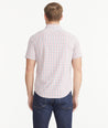 Model is wearing Red White & Blue Check Wrinkle-Free Performance Short-Sleeve Gaten Shirt.