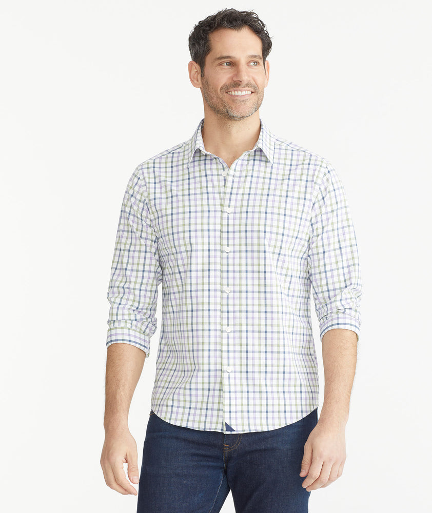 Model is wearing UNTUCKit Lilac & Olive Check Wrinkle-Free Performance Hawkins Shirt.